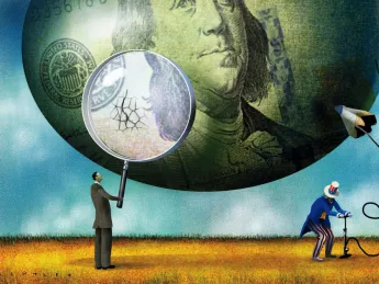 Cracks appear in a balloon decorated like a $100 bill as Uncle Sam fills it with a bicycle pump