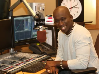 Derrick Ashong in the radio studio