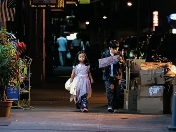 A production still from <i>Children of Invention,</i> with Crystal Chiu as Tina and Michael Chen as Raymond