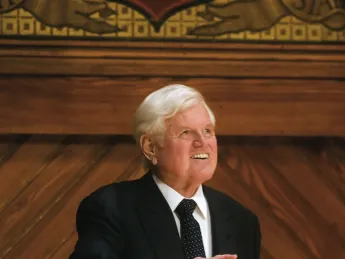 Senator Kennedy acknowledges his audience in Sanders Theatre last December, when he received an honorary degree.