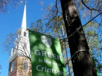 Trimmed in green for Gore's speech, Tercentenary Theatre was ringed with food tents serving locally produced hot cider, squash soup, and apple crisp to check the chills brought on by a raw fall day. (The photograph was taken earlier in the week when clear skies prevailed.)