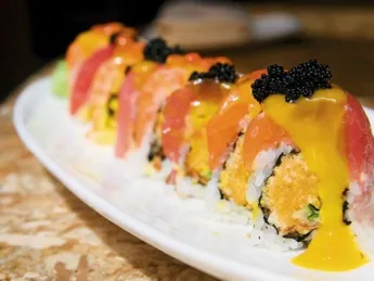 The &ldquo;Crunchy Roll&rdquo; with salmon, tuna, and mango sauce.