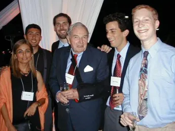 David Rockefeller meets Harvard students studying in Chile in 2003.