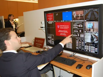 A jumbo touchscreen allows the person running an experiment to control what appears on participants' screens.