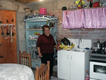 Rosa Estrella Ortega Roa has big plans for the unit where she lives with her two-year-old grandson. Although the walls and ceiling of her kitchen are still unfinished... [click the images below for more]