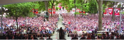 paranoramic photo of Bono's audience, shot from behind the podium