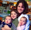 Patti and her children in her lab at Joslin Diabetes Center