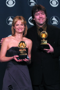 Two top pluckers on a three-finger roll: banjoists Alison Brown and Bela Fleck with their Grammys.