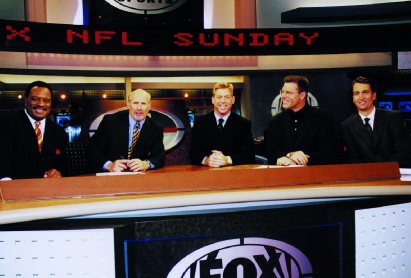 Brown and other commentators at Fox NFL broadcast desk