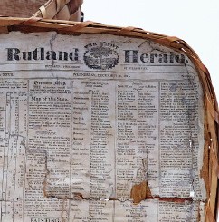 inside view of basket cover shows newspaper lining