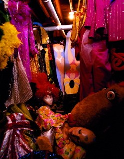 close up view of the Hasty Pudding costume closet showing many colorful costumes