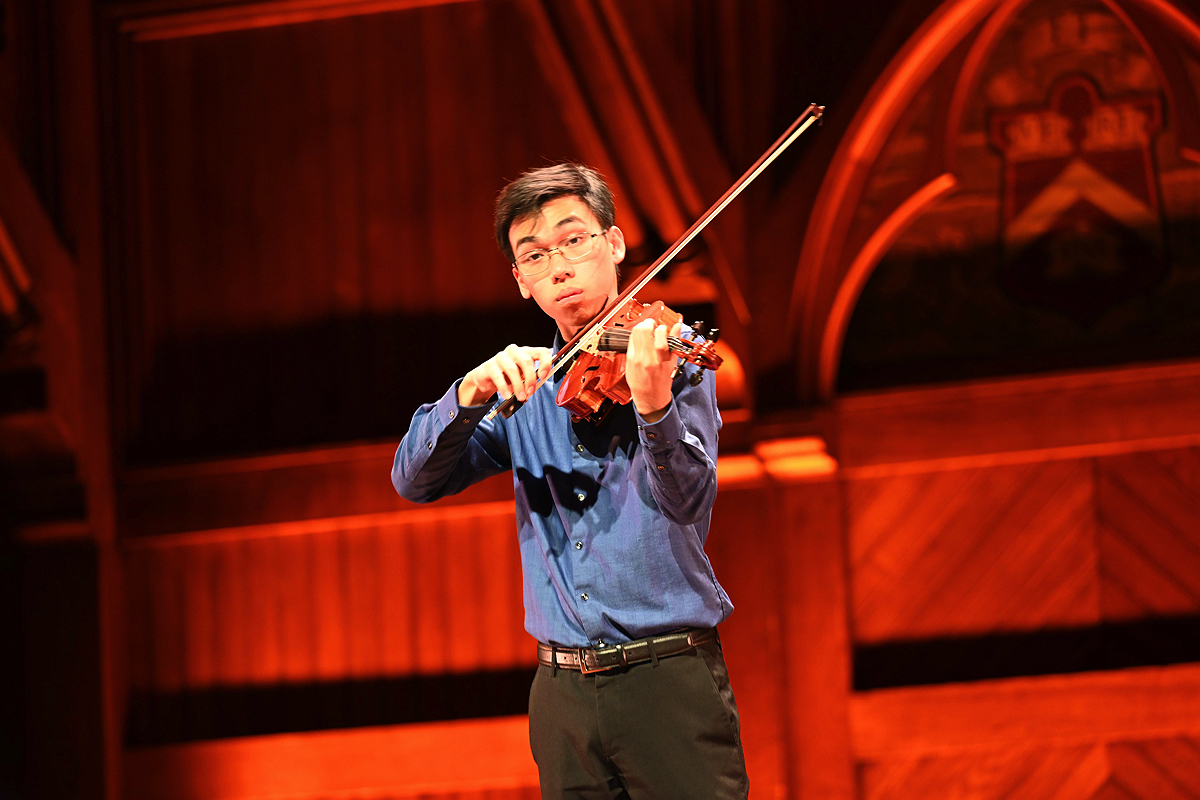 Man playing violin on stage