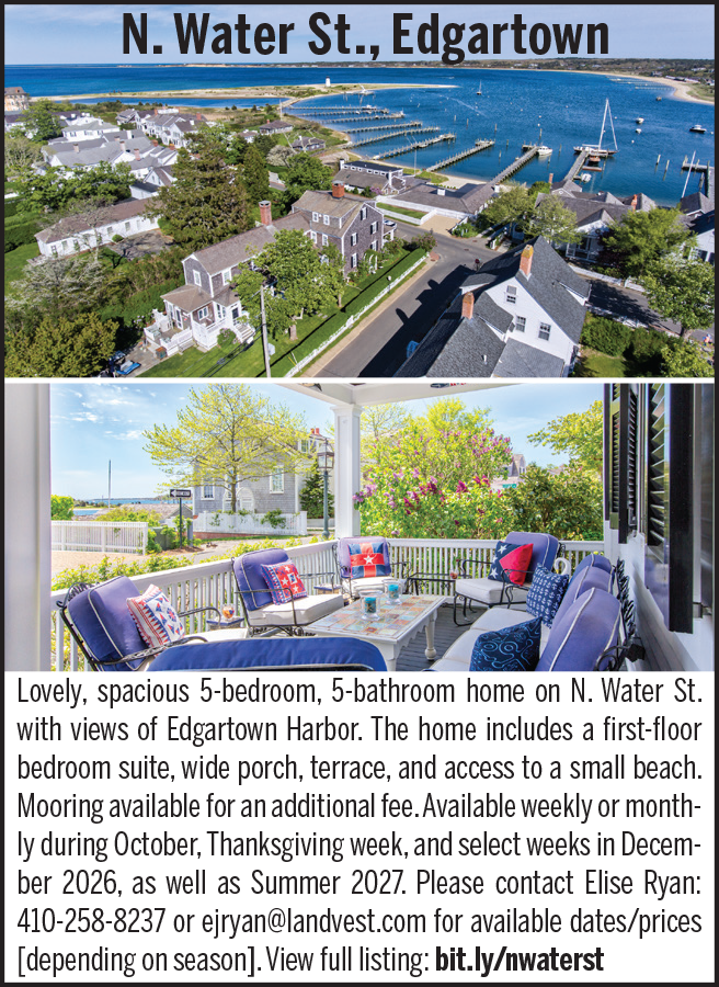 Spacious 5-bedroom home on N. Water St. with harbor views and outdoor seating area.
