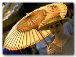Under the parasol, Caitlin Anderson '96 of Pforzheimer House and Hopkinton, Massachusetts.