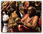 Priests circle the temple with water to be used in the consecration ceremony, the 'mahakumbhabhishekam' in May, 1990