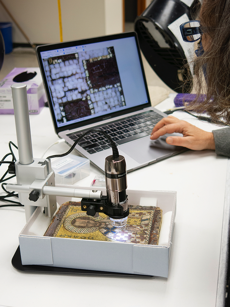 mosaic being scanned and observed on a computer screen