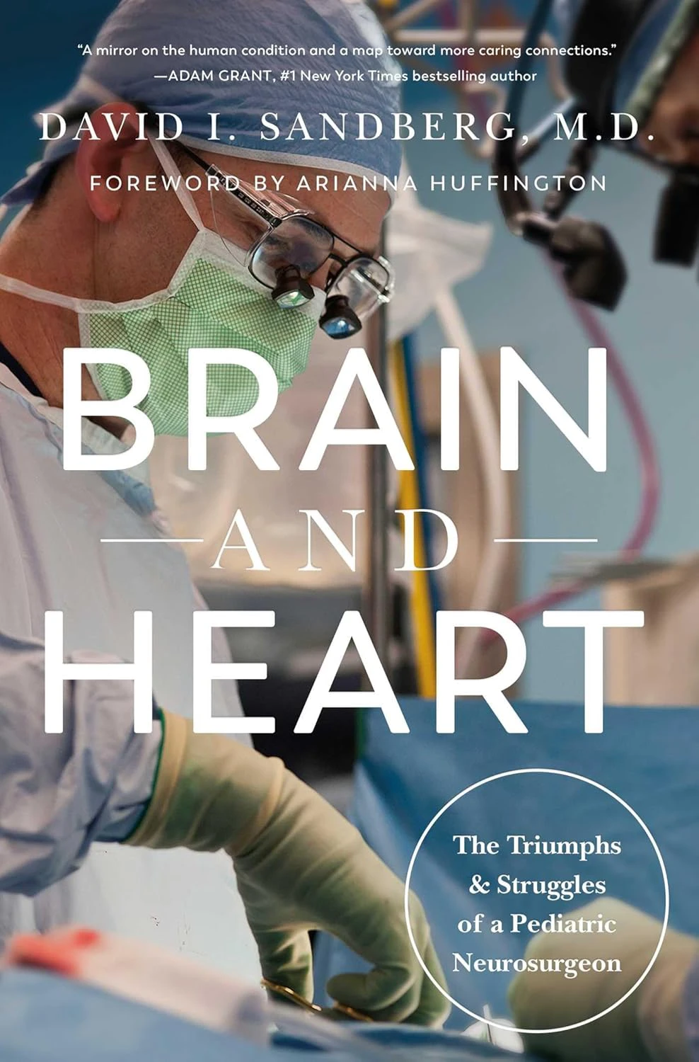 Book cover for "Brain and Heart: The Triumphs and Struggles of a Pediatric Neurosurgeon" by David I. Sandberg with a photograph of a neurosurgeon performing surgery