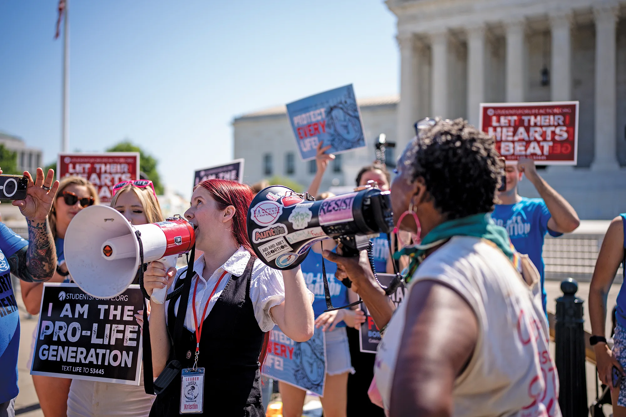Pro-life demonstrators with megaphones outside Supreme Court.