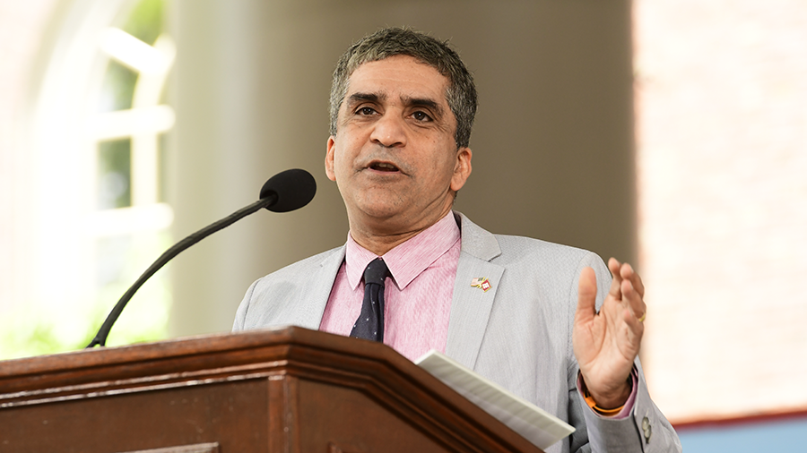 Dean Rakesh Khurana speaking at podium