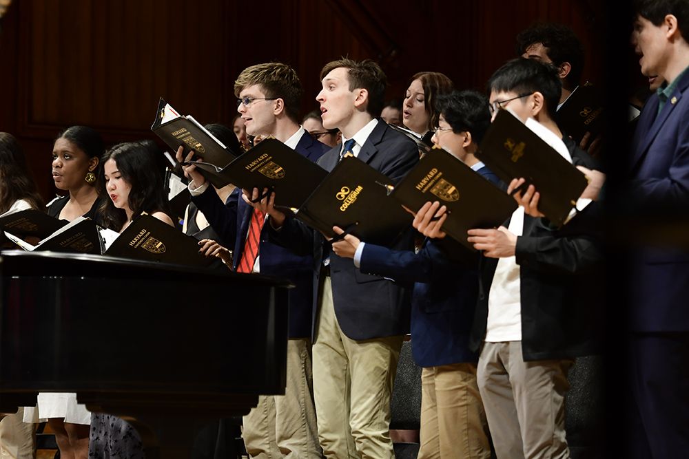 Chorus members singing