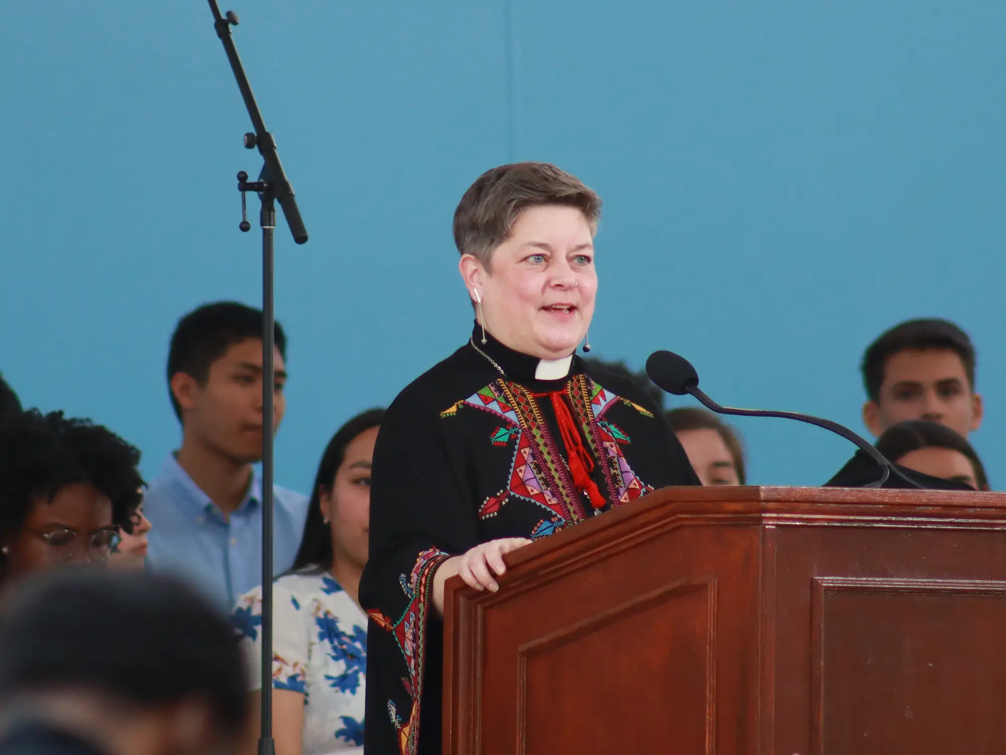 Carrie Ballenger speaks at a podium