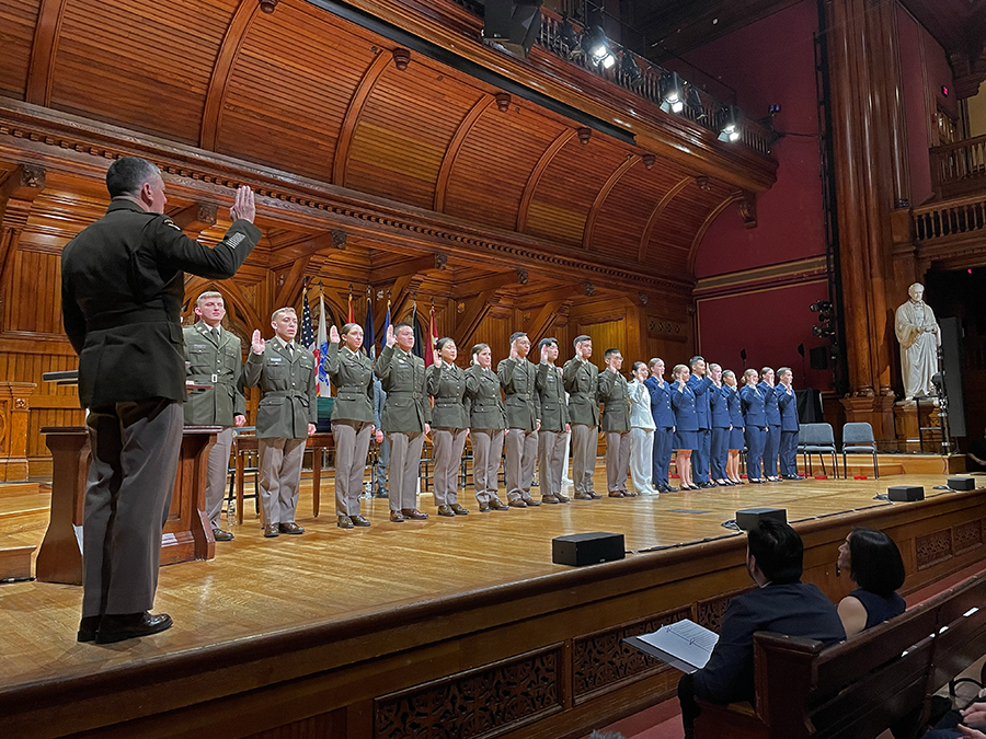 A line of cadets are read the Oath of Office by Lt. Gen. McGee