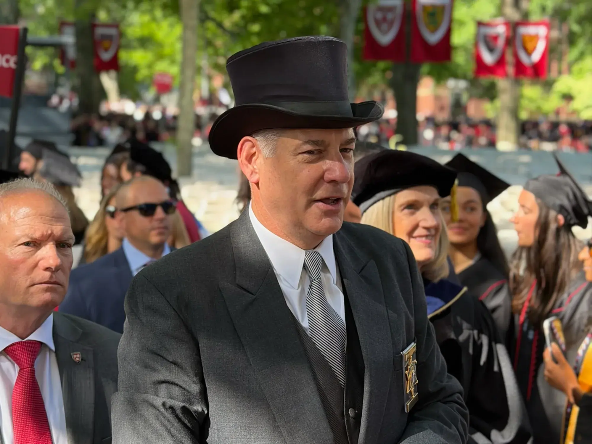 Man in suit and top hat