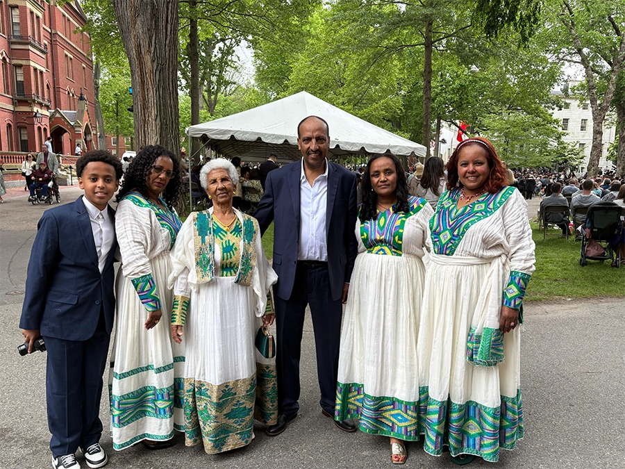family poses for commencement