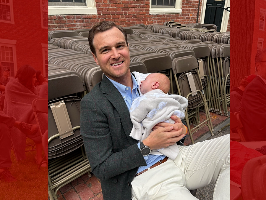 Derick Raabe and three-week-old son Whit