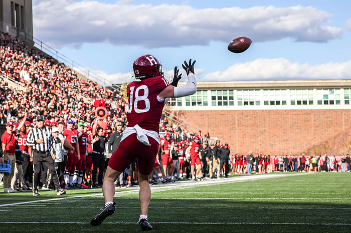 Harvard player #18 prepares to catch ball