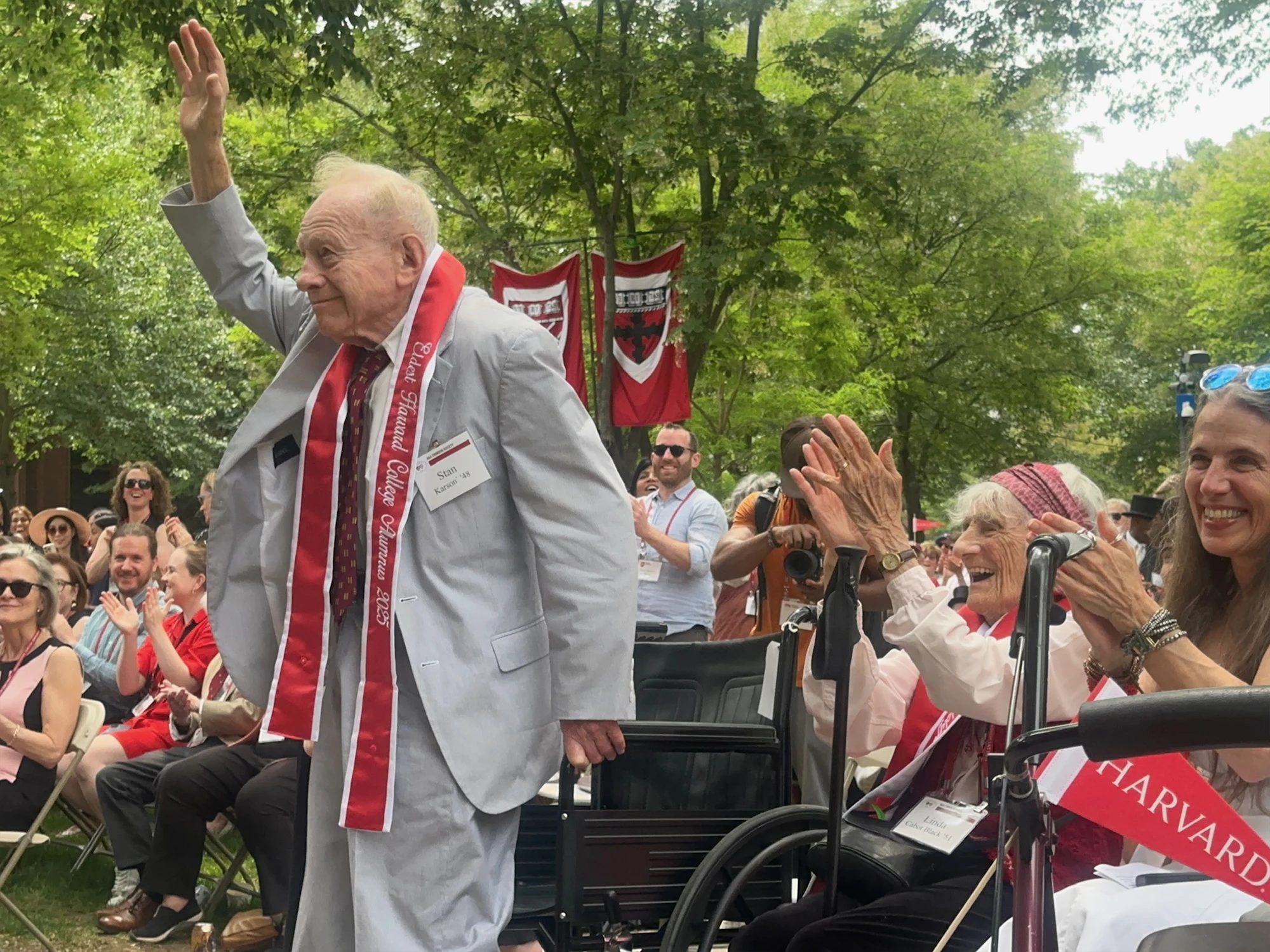 Stanley G. Karson waves to crowd