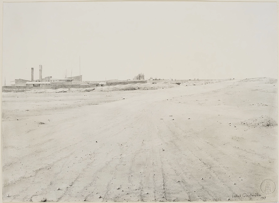 Desert-like barren land with faint tire tracks and distant industrial buildings under a pale sky.