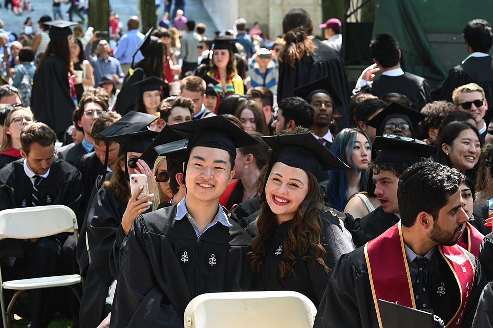 graduates in cap and gowns