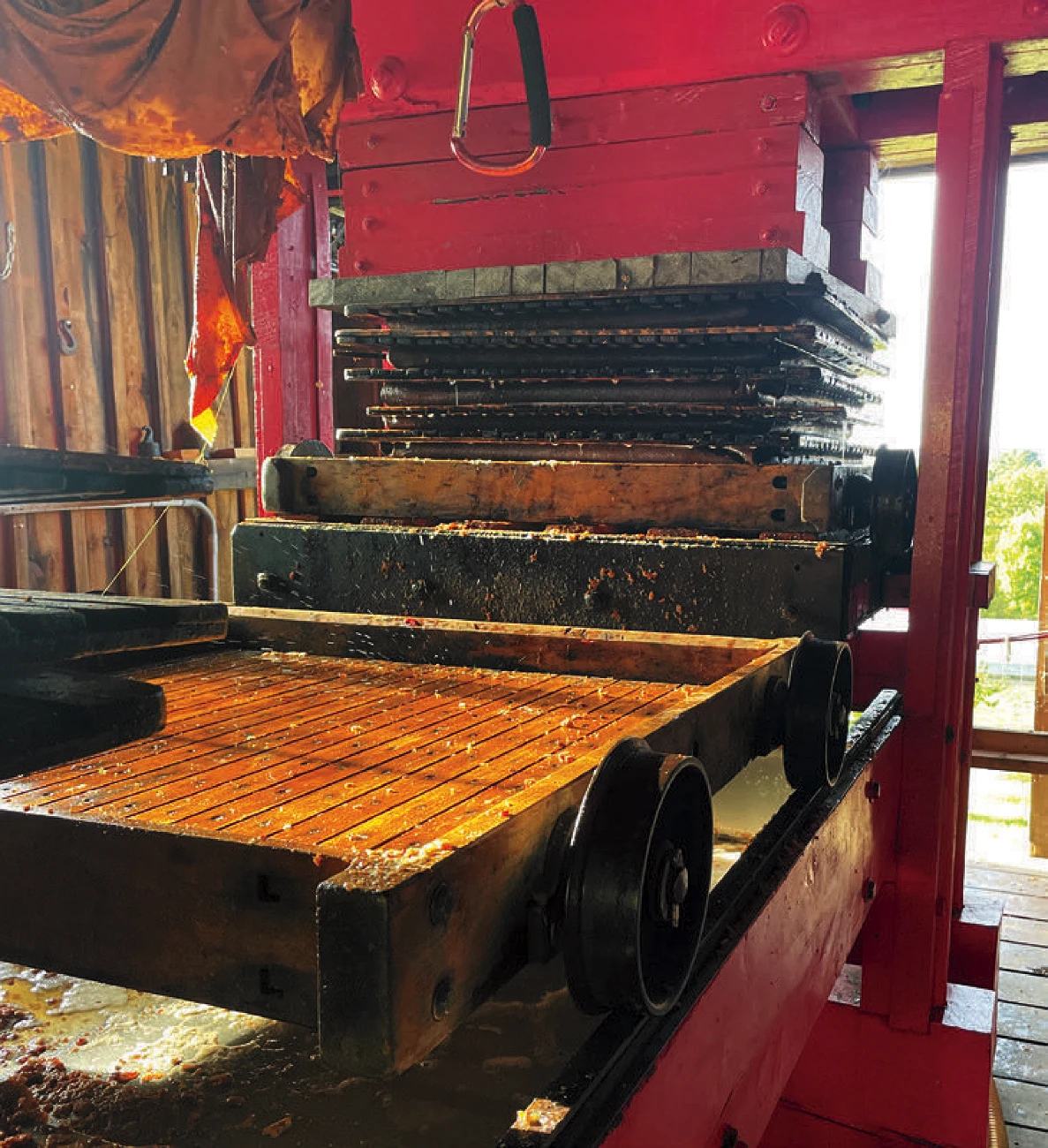 Century-old Mount Gilead cider press with wooden slats at Carr’s Ciderhouse.