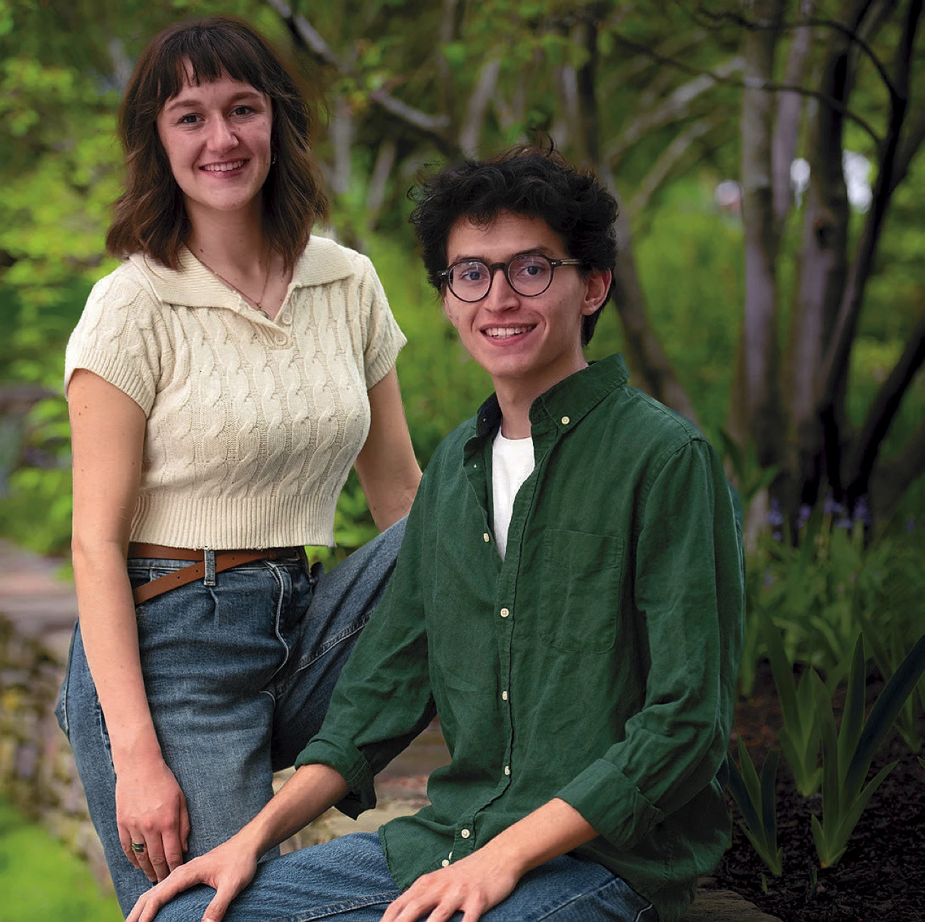 Kate Kaufman and Andrés Muedano smiling together outdoors.