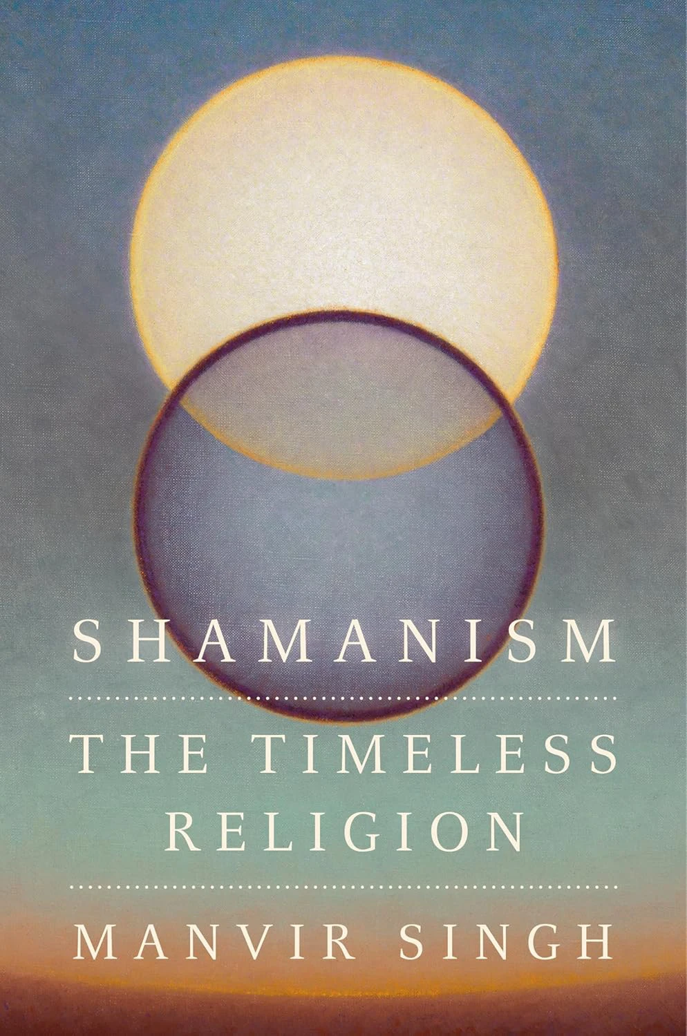 Book cover for "Shamanism: The Timeless Religion" bu Manvir Singh with two intersection circles, one dark and one light