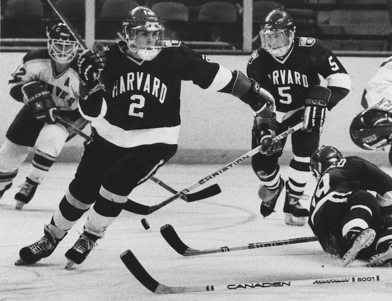 Don Sweeney in his Harvard hockey uniform, mid game