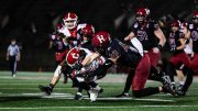Harvard football player tackles Cornell linebacker who has the ball