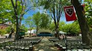 Rows of chairs set up in Tercentenary Theatre with tented stage in the distance