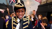 A boy in period military dress