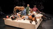 a performance of Faye Driscoll's "Weathering," where ten figures are writhing around a rotating platform