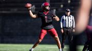 Harvard player #1 prepares to throw the ball