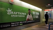 Photograph of advertising billboard promoting online gambling on sports