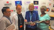 JoAnn Manson (center, in blue) meeting with research staff 