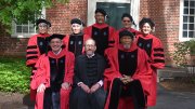 Back row from left: Rita Moreno, Elaine H. Kim, Abraham Verghese, Richard Alley, and  Esther Duflo  Front row from left: Provost John F. Manning, President Alan M. Garber, and Kareem Abdul-Jabbar