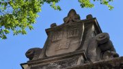 The “Veritas” motto etched into stone atop the 1875 gate into Harvard Yard
