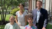 Harvard students Olivia Zheng, Richard Rodgers, Eli Johnson-Visio, Julia Grinstead, pose outside near Harvard University