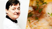 A chef smiling, dressed in a white coat, next to a close-up of a dish garnished with herbs.