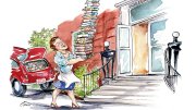 A woman (Julia Child) struggles to carry a tall stack of books while approaching a building.