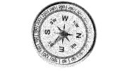 A vintage compass with cardinal directions marked in black and white.